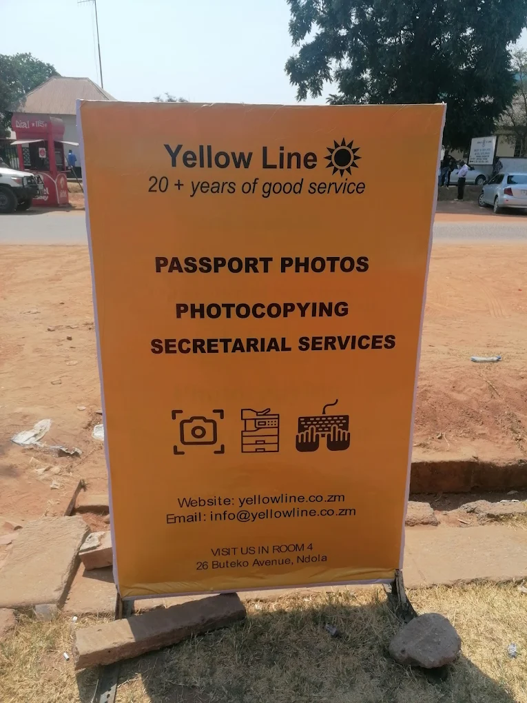 Passport photo services in Ndola, Zambia Image of signboard for Yellow Line PassPort photo services in Ndola